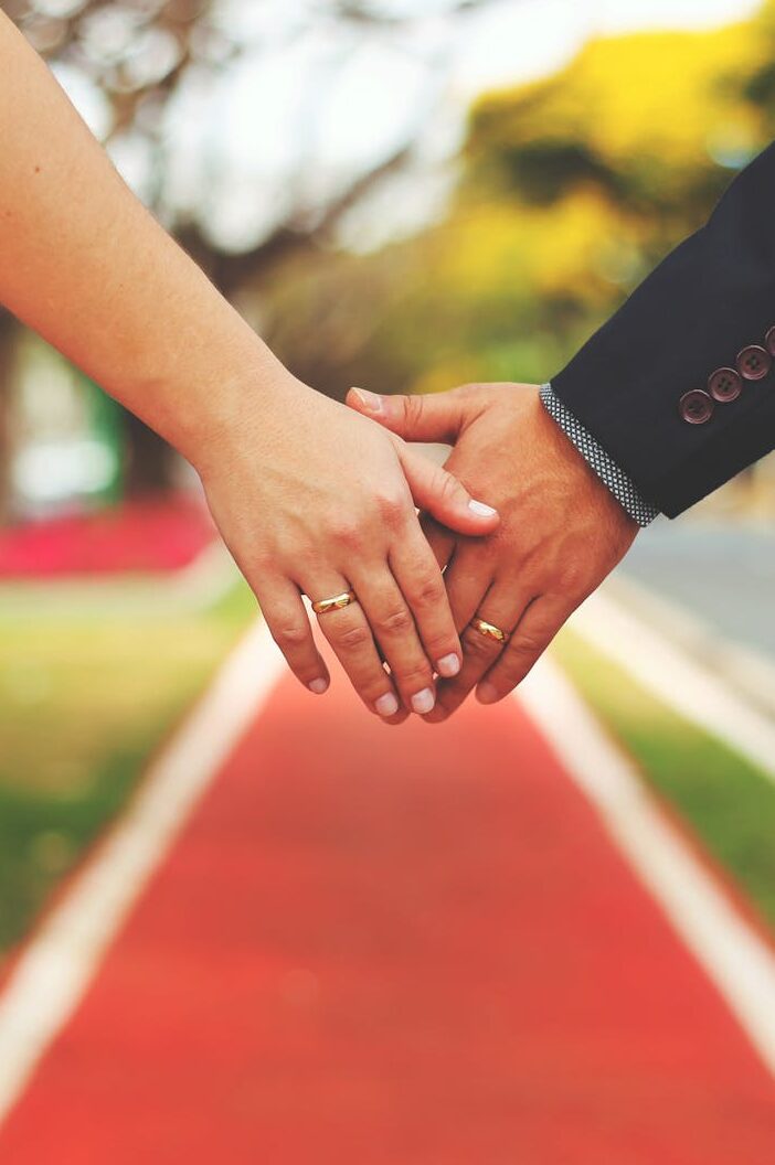 Bride and Groom Holding Hands