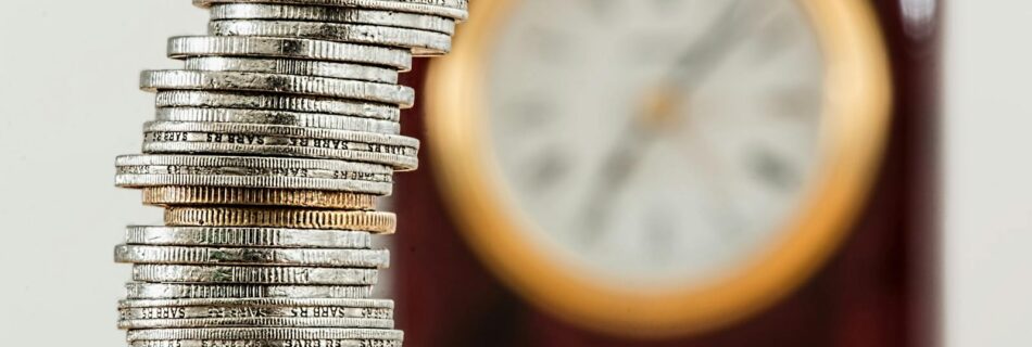 Selective Focus Photo of Stacked Coins