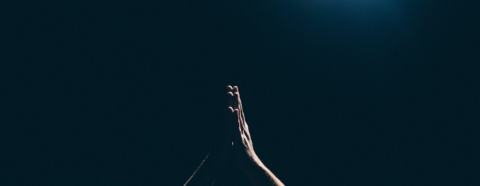 person raising arms